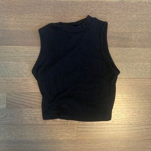 This is a solid black rib-knit cropped tank top from SHEIN